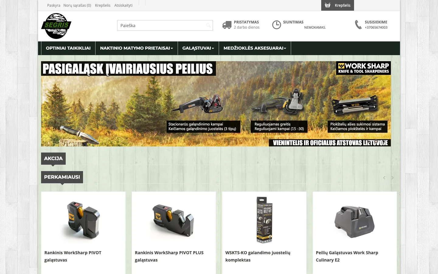 The old e.segris.lt home page on a desktop: a narrow centred layout on a wood-texture background, a round logo, a dark menu bar and a Work Sharp promo banner.